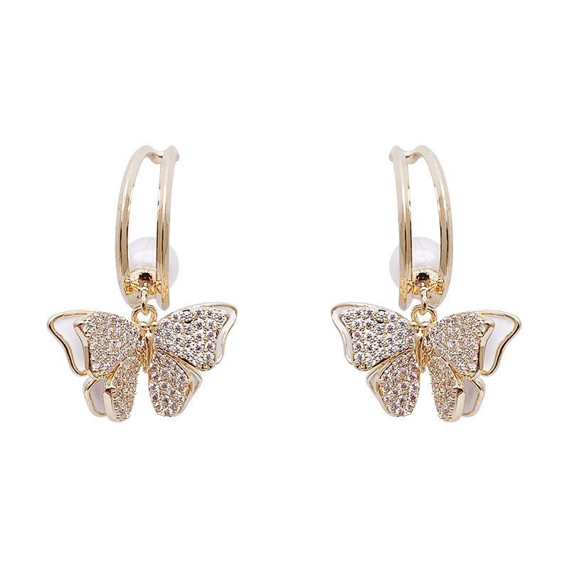Boucles d'oreilles papillons diamant et perle coquille double faces