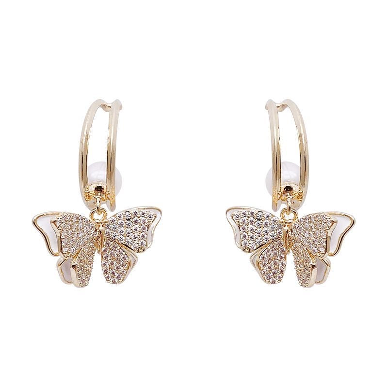 Boucles d'oreilles papillons diamant et perle coquille double faces