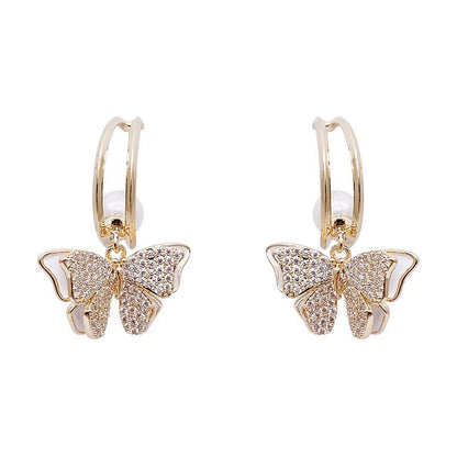 Boucles d'oreilles papillons diamant et perle coquille double faces